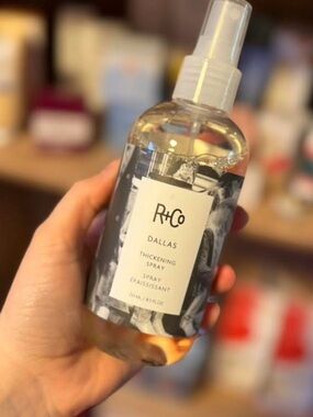 R+Co Dallas Thickening Spray — Clear Bottle with White Label